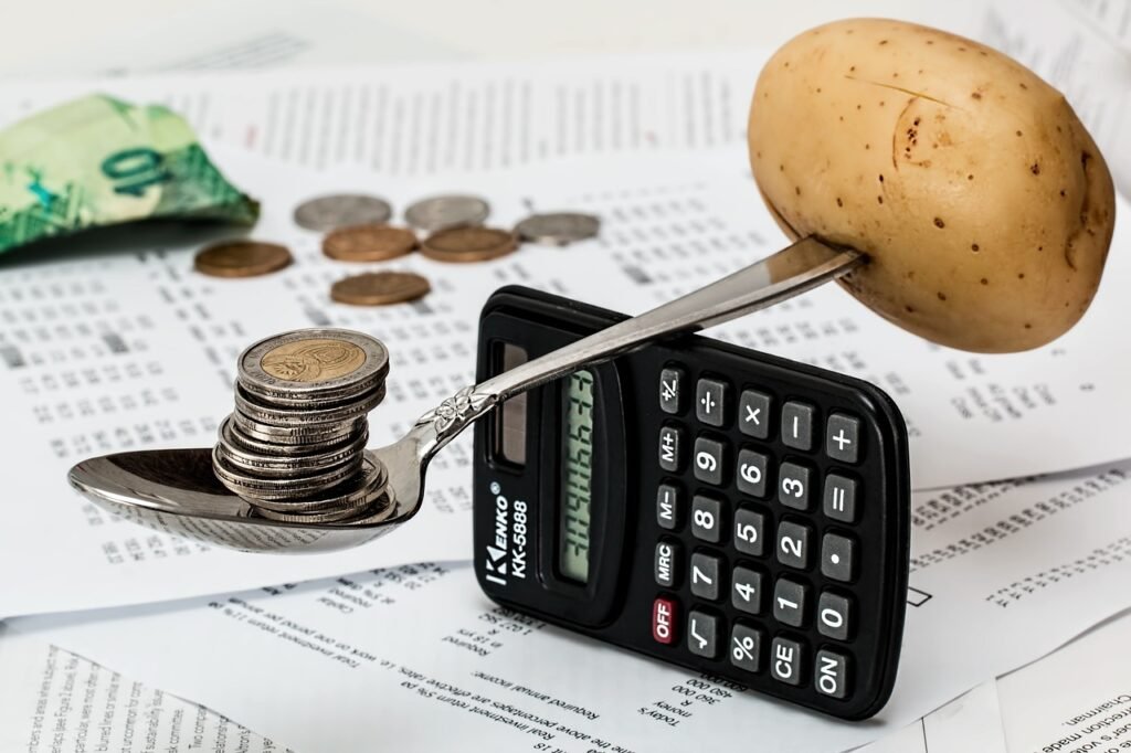 money balancing on a calculator